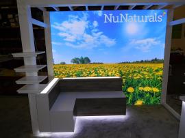 Custom Exhibit with Pergola, Product Shelves, Benches, LED Lightbox, Perimeter Accent Lights