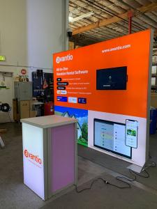 RENTAL: RE-1091 Inline Design with 114" Wide x 95" High Single-Sided Lightbox with Fabric Blocker Panel, Baseplates, Monitor Mount, 32" Monitor, RE-1566 Backlit Reception Counter, and SEG Backlit Fabric Graphics -- View 2