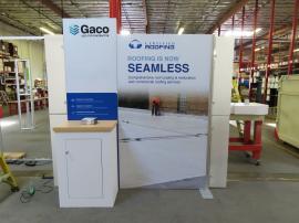 Modified ECO-1126 Sustainable Inline with Tension Fabric Graphics, Accent Wings, Aluminum Extrusion Frame, Counter with Locking Storage, Monitor Mount, and Adjustable LED Stem Lights