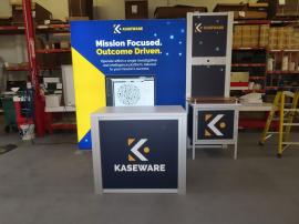 Custom Inline Exhibit with Backlit LB Graphics, Backwall Kiosk w/ Storage, Monitor Mount, and MOD-1278 Counter with Locking Storage