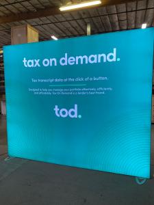 RENTAL:  RE-1042 LED Lightbox with SEG Fabric Graphic and RE-1255 Portable Counter with Locking Storage -- View 2