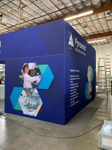 RENTAL: Island Design with L-Shaped Gravitee Panel System Backwall -- View 3