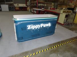 Custom Counter with RGBW LED Lights, Rounded Corners, Push-thru Backlit Logo, and Locking Storage and Freestanding Sign with LED Accent Lights
