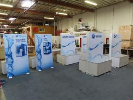 (6) Custom Double-sided Lightboxes (60 x 90 and 48 x 96) with SEG Fabric Graphics and (1) Laminated Counters with Locking Storage and RGB LED Accent Lights -- View 3
